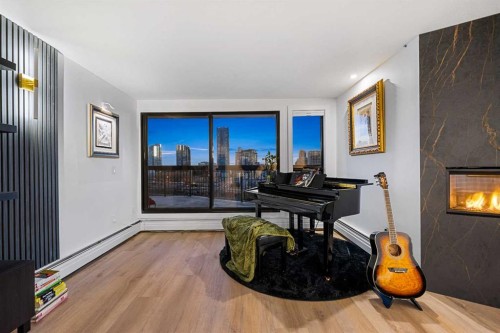 601-320 Meredith Road Ne, Calgary, AB - Indoor With Fireplace