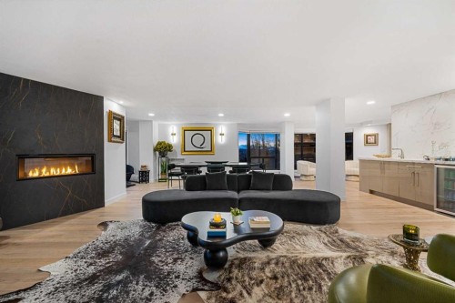 601-320 Meredith Road Ne, Calgary, AB - Indoor Photo Showing Living Room With Fireplace