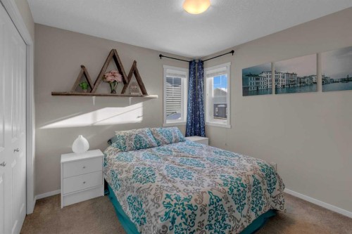 173 Kingsbury Close Se, Airdrie, AB - Indoor Photo Showing Bedroom
