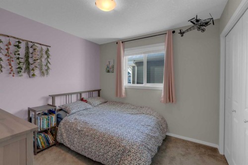 173 Kingsbury Close Se, Airdrie, AB - Indoor Photo Showing Bedroom