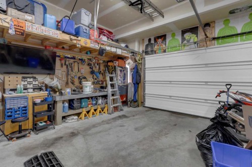173 Kingsbury Close Se, Airdrie, AB - Indoor Photo Showing Garage