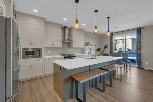 173 Kingsbury Close Se, Airdrie, AB - Indoor Photo Showing Kitchen With Upgraded Kitchen