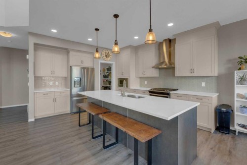173 Kingsbury Close Se, Airdrie, AB - Indoor Photo Showing Kitchen With Stainless Steel Kitchen With Upgraded Kitchen