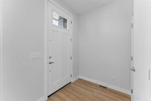 1125 Sailfin Heath, Rural Rocky View County, AB - Indoor Photo Showing Other Room