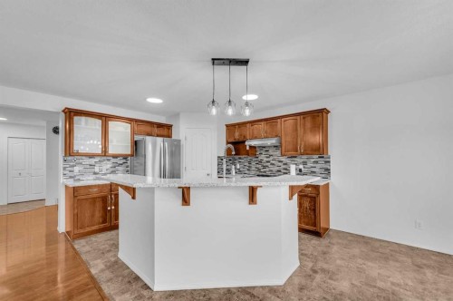 57 Saddlecrest Park Ne, Calgary, AB - Indoor Photo Showing Kitchen