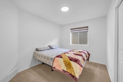 57 Saddlecrest Park Ne, Calgary, AB - Indoor Photo Showing Bedroom
