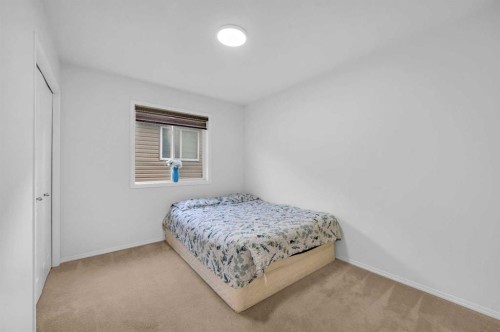 57 Saddlecrest Park Ne, Calgary, AB - Indoor Photo Showing Bedroom