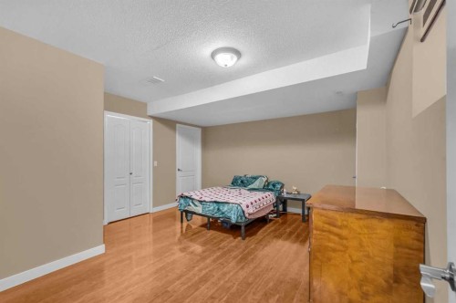 57 Saddlecrest Park Ne, Calgary, AB - Indoor Photo Showing Bedroom