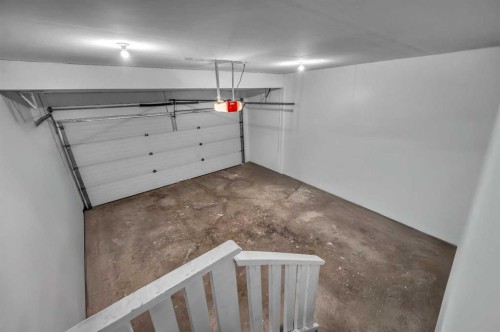 57 Saddlecrest Park Ne, Calgary, AB - Indoor Photo Showing Garage