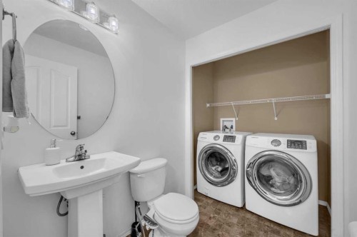 57 Saddlecrest Park Ne, Calgary, AB - Indoor Photo Showing Laundry Room