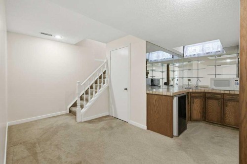 14804 Deer Run Drive Se, Calgary, AB - Indoor Photo Showing Other Room