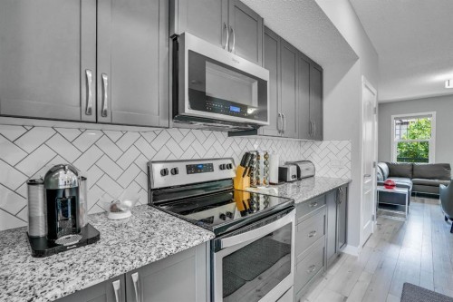 1370 Legacy Circle Se, Calgary, AB - Indoor Photo Showing Kitchen With Upgraded Kitchen