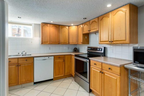 4603 79 Street Nw, Calgary, AB - Indoor Photo Showing Kitchen With Double Sink