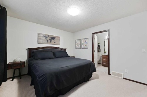 71 Cranberry Place Se, Calgary, AB - Indoor Photo Showing Bedroom