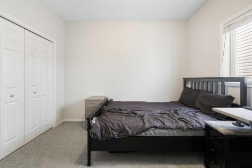46 Bridleridge Way Sw, Calgary, AB - Indoor Photo Showing Bedroom