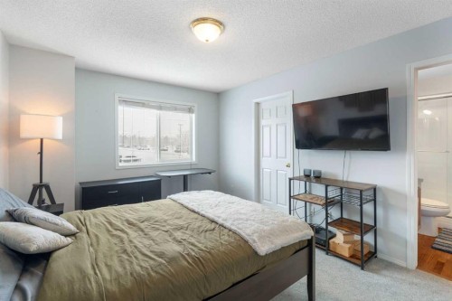 46 Bridleridge Way Sw, Calgary, AB - Indoor Photo Showing Bedroom