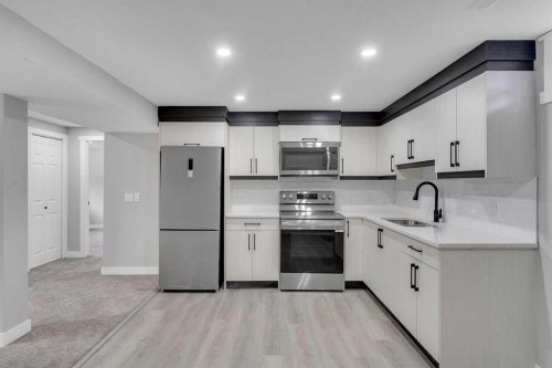 992 Rundlecairn Way Ne, Calgary, AB - Indoor Photo Showing Kitchen With Stainless Steel Kitchen