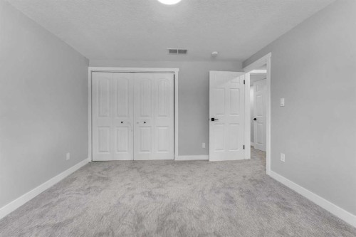 992 Rundlecairn Way Ne, Calgary, AB - Indoor Photo Showing Other Room