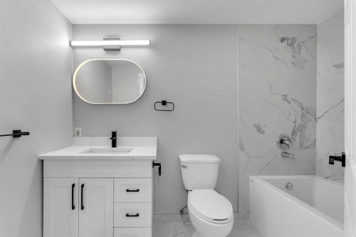 992 Rundlecairn Way Ne, Calgary, AB - Indoor Photo Showing Bathroom