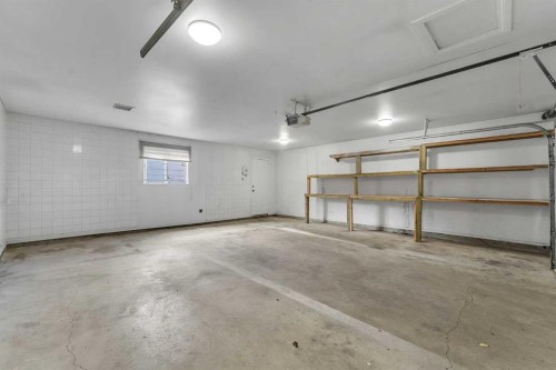 992 Rundlecairn Way Ne, Calgary, AB - Indoor Photo Showing Garage