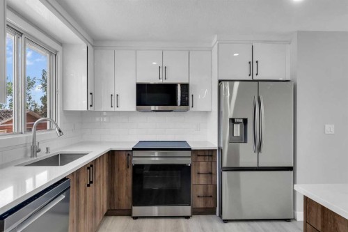 992 Rundlecairn Way Ne, Calgary, AB - Indoor Photo Showing Kitchen With Stainless Steel Kitchen With Upgraded Kitchen
