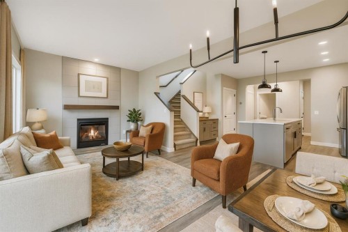 230 Wildrose Drive, Strathmore, AB - Indoor Photo Showing Living Room With Fireplace