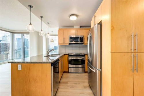 1700-817 15 Avenue Sw, Calgary, AB - Indoor Photo Showing Kitchen With Stainless Steel Kitchen