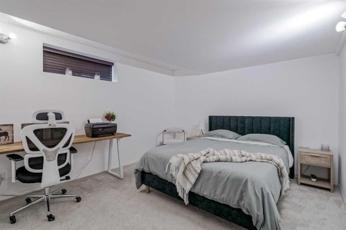 67 Silver Springs Way Nw, Airdrie, AB - Indoor Photo Showing Bedroom