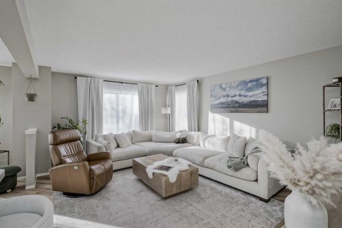 67 Silver Springs Way Nw, Airdrie, AB - Indoor Photo Showing Living Room