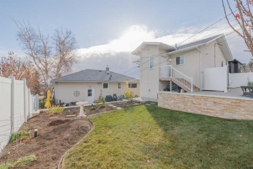 25 Highwood Place Nw, Calgary, AB - Outdoor With Deck Patio Veranda With Exterior