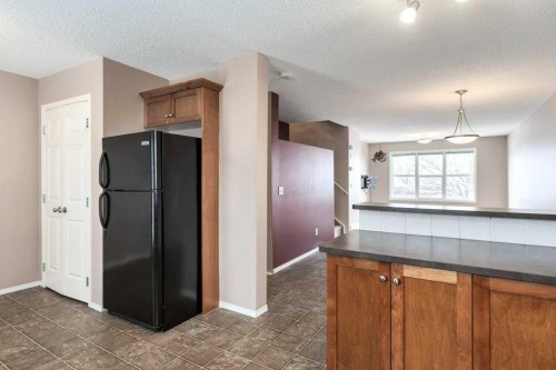 1102 Prairie Sound Circle Nw, High River, AB - Indoor Photo Showing Kitchen