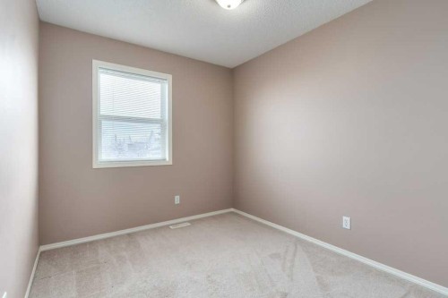 1102 Prairie Sound Circle Nw, High River, AB - Indoor Photo Showing Other Room