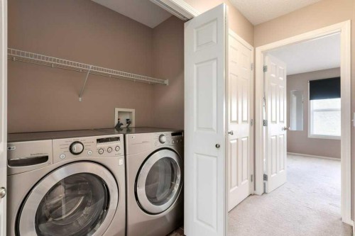 1102 Prairie Sound Circle Nw, High River, AB - Indoor Photo Showing Laundry Room