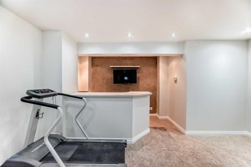 170 Country Hills Heights, Calgary, AB - Indoor Photo Showing Gym Room