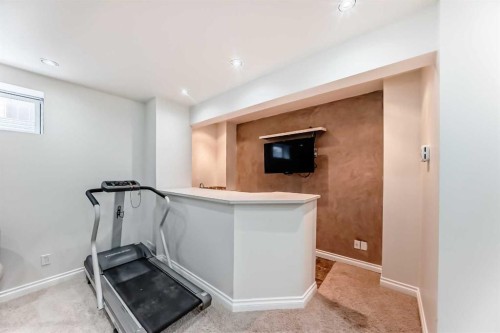 170 Country Hills Heights, Calgary, AB - Indoor Photo Showing Gym Room