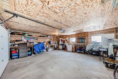 170 Country Hills Heights, Calgary, AB - Indoor Photo Showing Garage