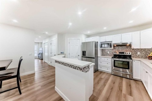 170 Country Hills Heights, Calgary, AB - Indoor Photo Showing Kitchen With Upgraded Kitchen