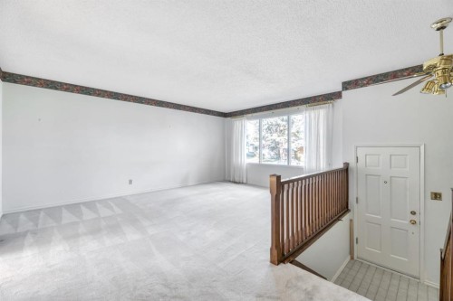 23 Brazeau Crescent Sw, Calgary, AB - Indoor Photo Showing Other Room