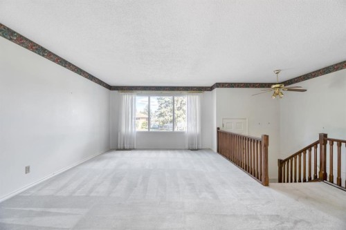 23 Brazeau Crescent Sw, Calgary, AB - Indoor Photo Showing Other Room