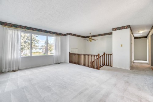 23 Brazeau Crescent Sw, Calgary, AB - Indoor Photo Showing Other Room
