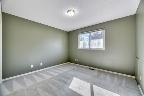 23 Brazeau Crescent Sw, Calgary, AB - Indoor Photo Showing Other Room