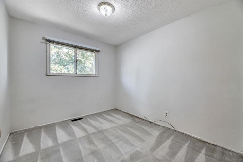 23 Brazeau Crescent Sw, Calgary, AB - Indoor Photo Showing Other Room