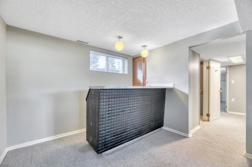 23 Brazeau Crescent Sw, Calgary, AB - Indoor Photo Showing Other Room