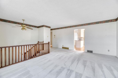 23 Brazeau Crescent Sw, Calgary, AB - Indoor Photo Showing Other Room