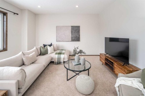 164 Everbrook Drive Sw, Calgary, AB - Indoor Photo Showing Living Room