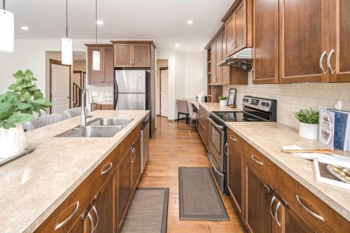164 Everbrook Drive Sw, Calgary, AB - Indoor Photo Showing Kitchen With Stainless Steel Kitchen With Double Sink With Upgraded Kitchen