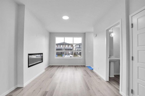 1905 Cornerstone Boulevard Ne, Calgary, AB - Indoor Photo Showing Living Room With Fireplace