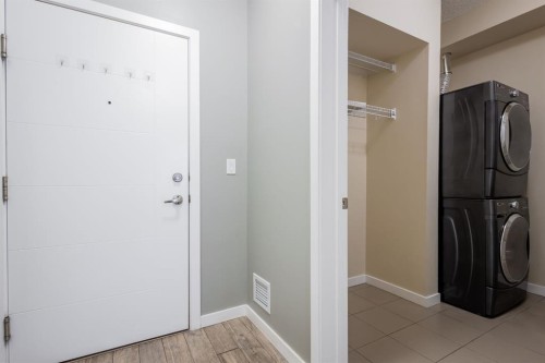 117-402 Marquis Lane Se, Calgary, AB - Indoor Photo Showing Laundry Room