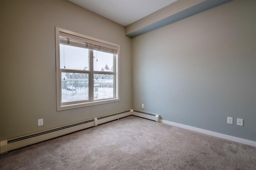 117-402 Marquis Lane Se, Calgary, AB - Indoor Photo Showing Other Room