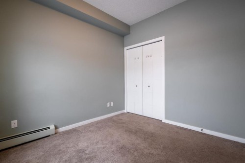 117-402 Marquis Lane Se, Calgary, AB - Indoor Photo Showing Other Room